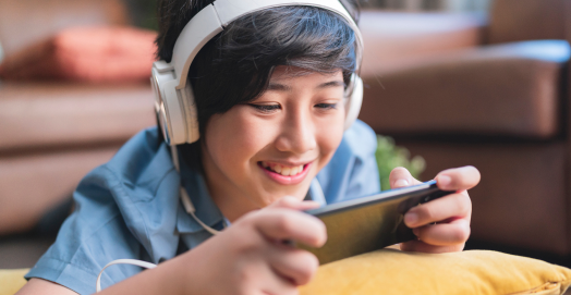 Kid playing mobile game
